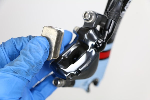 Changement d'une paire de plaquettes ou patins de freins